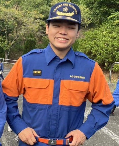 活動服を着用した山㟢団員